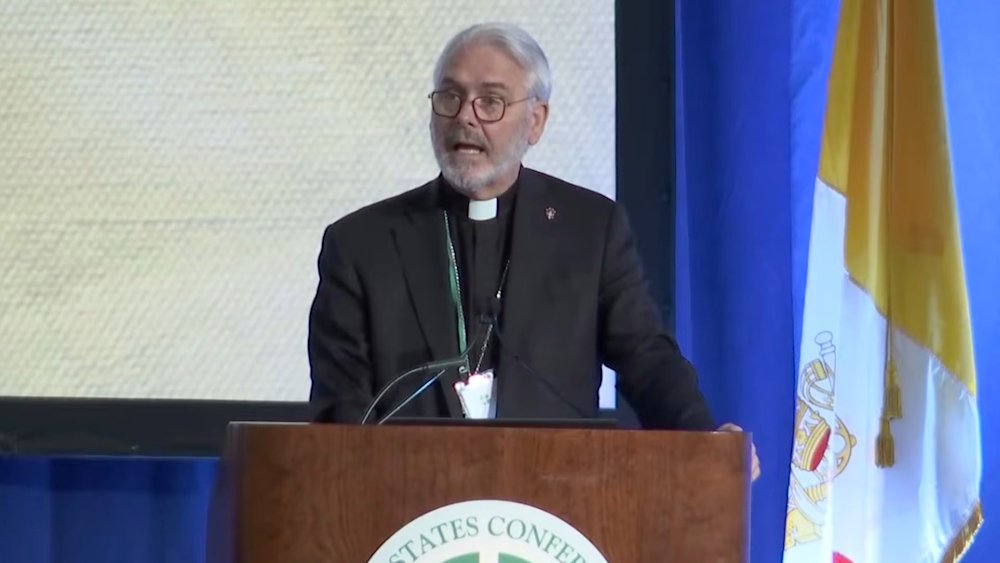 Archbishop Paul Coakley offers his first remarks as president of the U.S. Conference of Catholic Bishops at the spring plenary session in Orlando, Florida, on June 10.